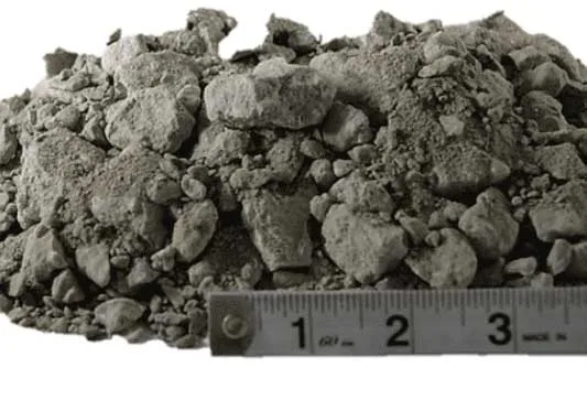 1.5 inch base rock recycled aggregate product — FDOT-approved crushed limerock for road base and structural fill, shown with ruler for scale