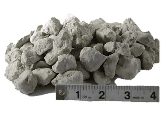 57 Rock recycled aggregate product — medium crushed stone used for drainage and concrete mix, shown with ruler for scale